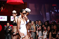 Models walk the runway at the LG Fashion Fusion Closing Night Gala at Nathan Phillips Square on October 25, 2008 in Toronto, Canada.